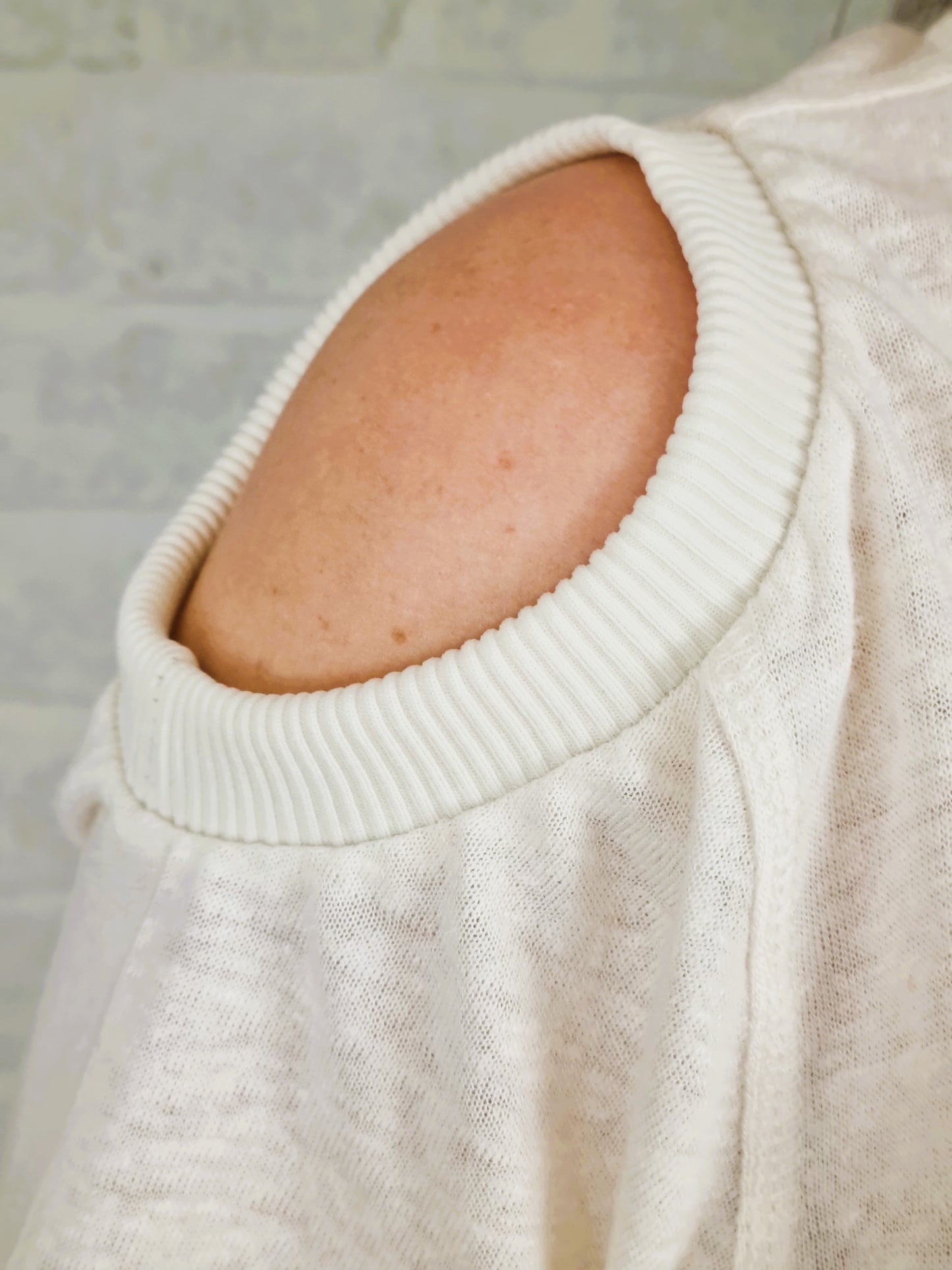 Linnen gebreide top – crème, asymmetrisch